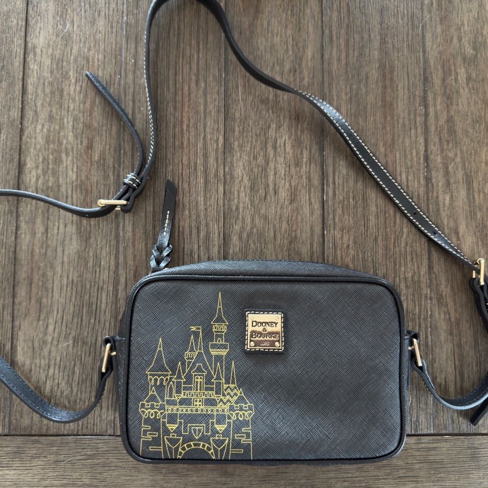 Dooney & Bourke Black and Gold Disney Castle Crossbody Bag
